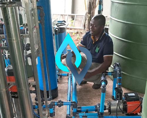 A modern water purification system installed in a home kitchen